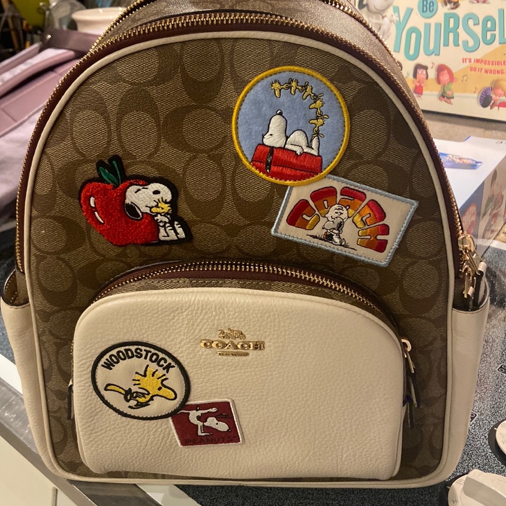 NWOT Peanuts Coach Court backpack purse